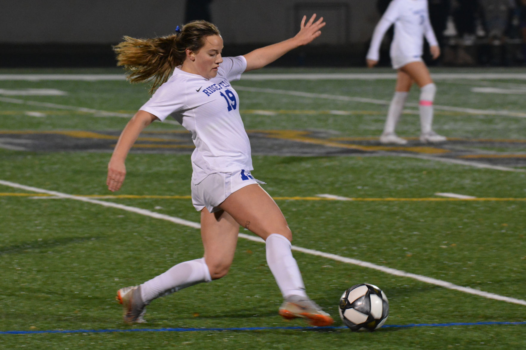 Kicking a soccer ball